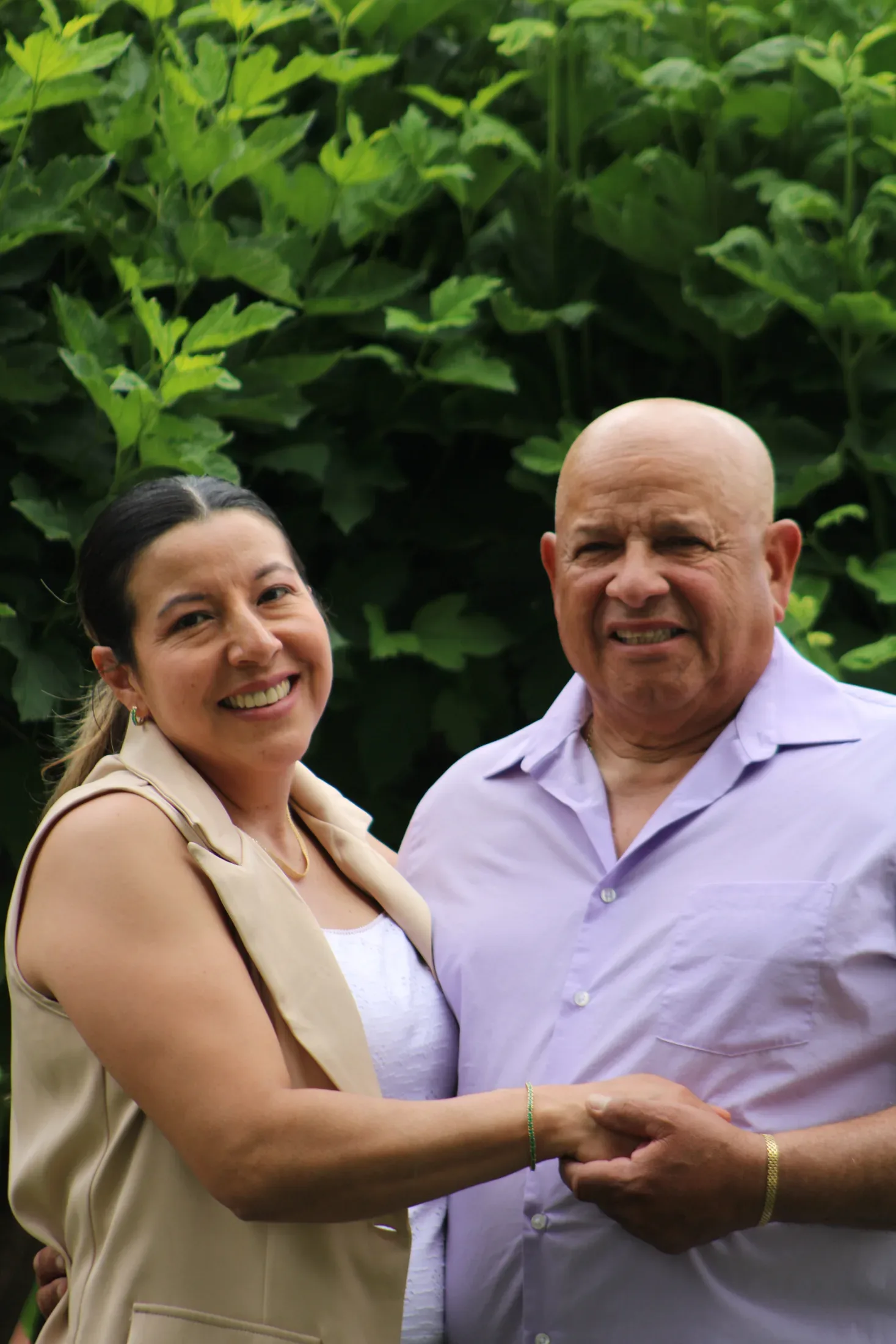 Soraya and Jefersson together, the married owner-manager team behind J & S Stone and Landscaping